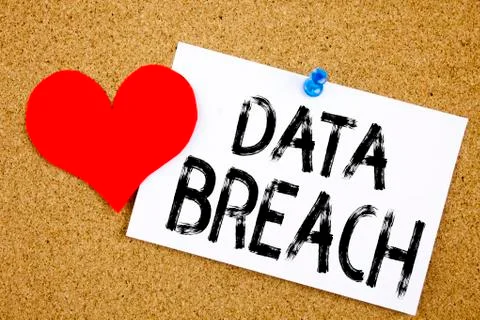 Writing Data Breach text made in the office close-up on laptop computer keybo Stock Photos