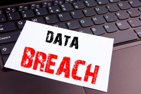 Writing Data Breach text made in the office close-up on laptop computer keybo Stock Photos