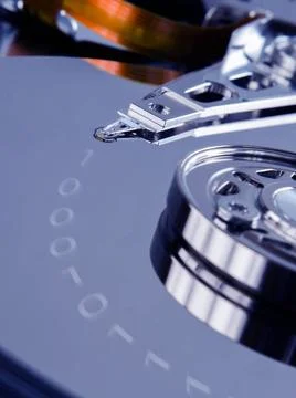 Writing data on hard disk Writing binary data on hard disk close-up. IT co... Stock Photos