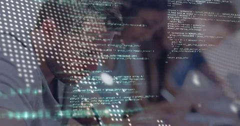 Writing developer taking notes on notebook at desk, showing code overlay, Stock Photos
