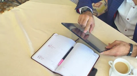 Writing in Diary in Cafe Stock Footage 68927635