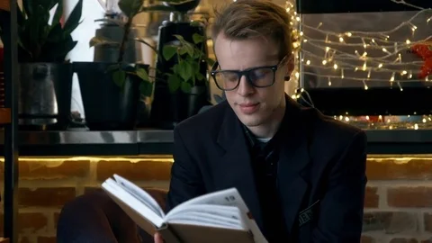 Writing in Diary in Cafe Stock Footage 71299875