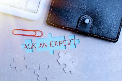 Writing displaying text Ask An Expert. Business concept consult someone who has Stock Photos