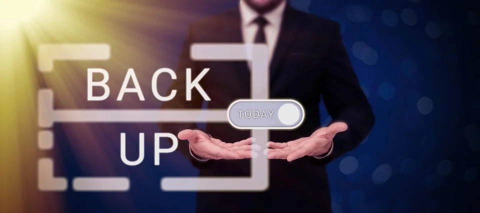 Writing displaying text Back Up. Concept meaning saving important data into Stock Photos