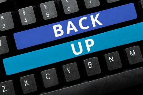 Writing displaying text Back Up. Word Written on saving important data into Stock Photos