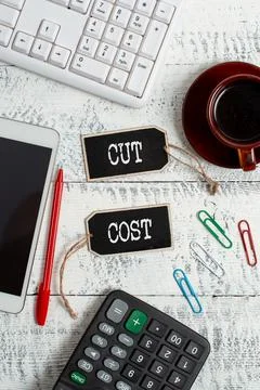 Writing displaying text Cut Cost. Word for Measures implemented to reduced Foto stock