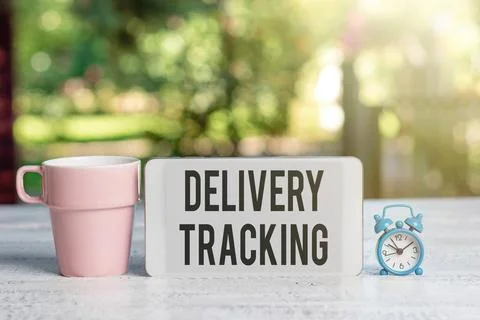 Writing displaying text Delivery Tracking. Word for the process of localizing Stock Photos