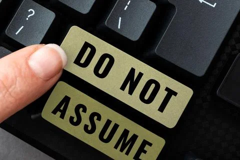 Writing displaying text Do Not Assume. Conceptual photo Ask first to avoid 写真素材