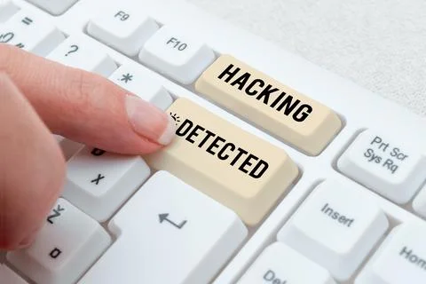 Writing displaying text Hacking Detected. Concept meaning activities that seek Stockfoto's