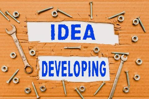 Writing displaying text Idea Developing. Word Written on innovating the concept Stock-Fotos