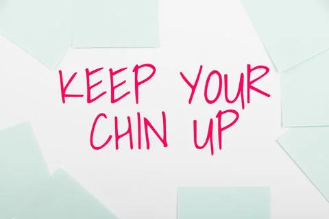 Writing displaying text Keep Your Chin UpRemain cheerful in difficult Stock Photos