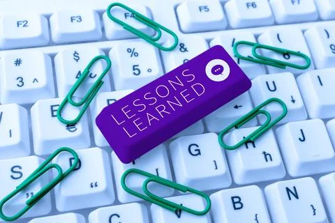 Writing displaying text Lessons LearnedPromote share and use knowledge derived Stock Photos