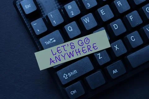 Writing displaying text Lets Go Anywhere. Internet Concept visit new places to Stock Photos
