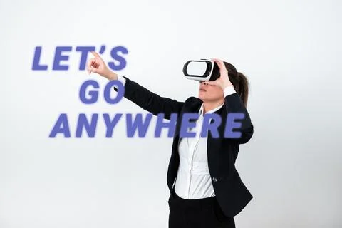 Writing displaying text Lets Go Anywhere. Internet Concept visit new places to Stock Photos