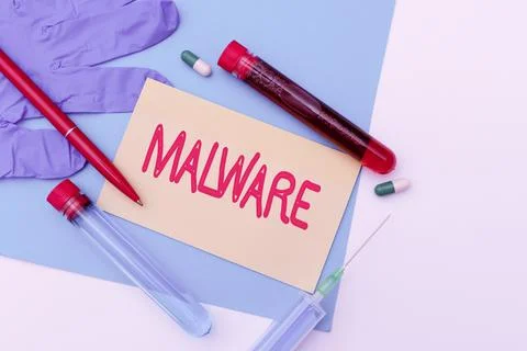 Writing displaying text Malware. Business idea malicious software or file that 写真素材