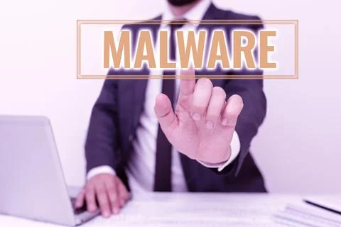 Writing displaying text Malware. Word Written on malicious software or file that 写真素材