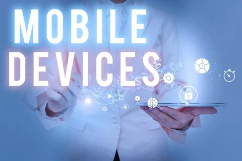 Writing displaying text Mobile Devices. Business concept A portable computing Stock Photos