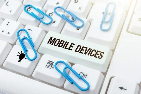 Writing displaying text Mobile Devices. Business overview A portable computing 写真素材