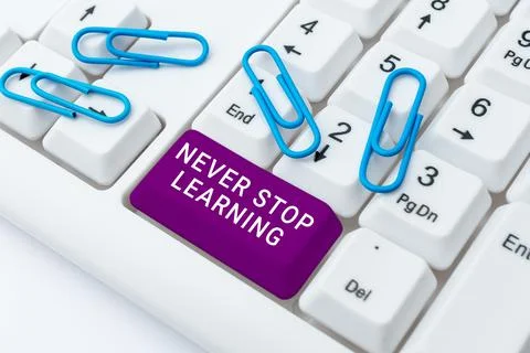 Writing displaying text Never Stop Learning. Business idea Continue to Improve Stock Photos