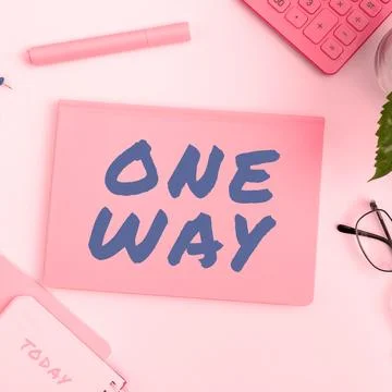 Writing displaying text One Way. Concept meaning Only direction Street sign Photos