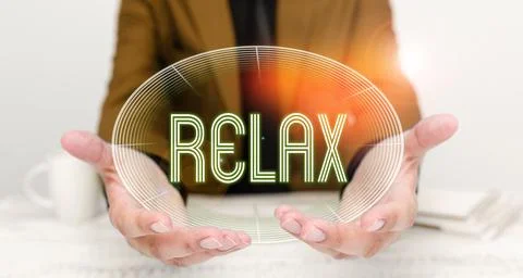 Writing displaying text Relax. Concept meaning make or become less tense anxious Stock-Fotos