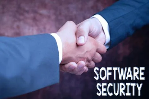 Writing displaying text Software Security. Word for implemented to protect Stock Photos