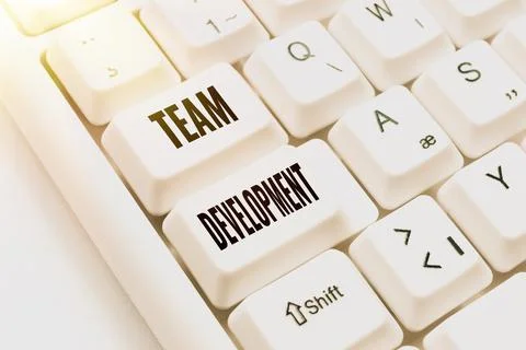 Writing displaying text Team Development. Business approach learn why and how 库存照片