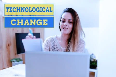 Writing displaying text Technological Change. Concept meaning increase in the 写真素材