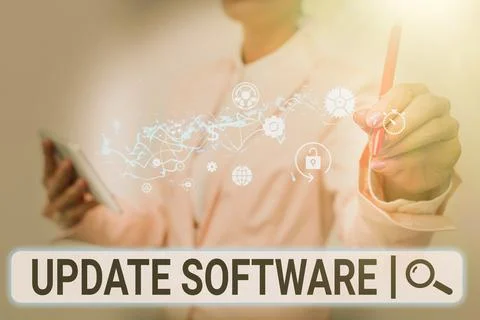 Writing displaying text Update Software. Internet Concept replacing program with Foto stock
