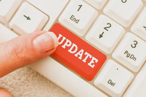 Writing displaying text Update. Word Written on Make something more modern Stockfoto's