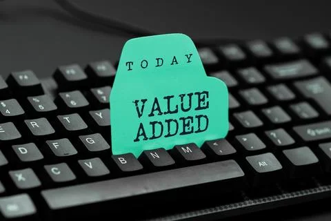 Writing displaying text Value Added. Business concept the extra value created Stock Photos