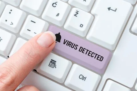 Writing displaying text Virus DetectedA computer program used to prevent and  Stock Photos