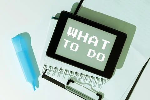 Writing displaying text What To Do. Concept meaning asking someone advice about Stock Photos