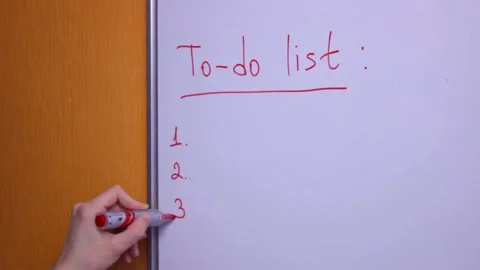 Writing to-do list on a whiteboard Stock Footage 147391567