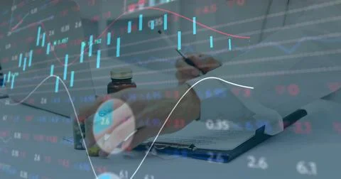 Writing doctor annotating document at white desk with amber bottles and chart Stock Photos