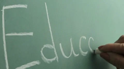 Writing education on a chalkboard Stock Footage 8964732