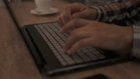 Writing email or working on computer, businessman hands type on laptop keyboard Stock Footage 117068897