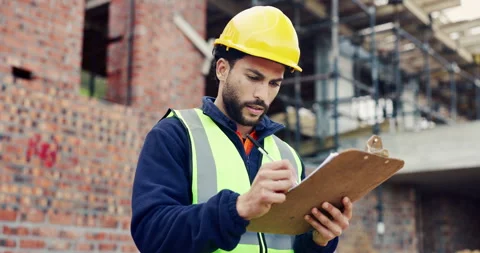 Writing, engineer or man with checklist for construction, property framing or Stock Footage 336780041