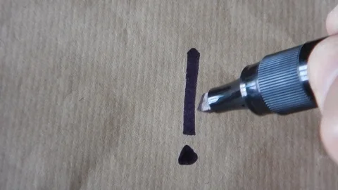 Writing the exclamation mark "!" Stock Footage 105852538