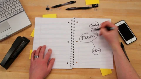 Writing idea web in notebook, top view Stock Footage 34477666