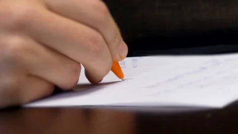 Writing Ideas On A Sheet of Paper Close Up Vídeo Stock 99493167