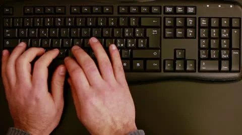 Writing on keyboard Stock Footage 10735423