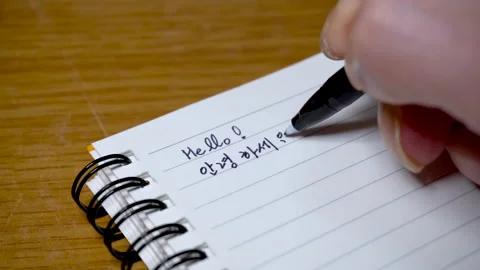 Writing Korean to Notes, hello in Korean,learning Korean,studying Korean Stock Footage 151488247