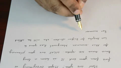 Writing a letter Stockbeeldmateriaal 140102411