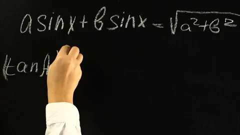 Writing math formulas on blackboard Stock Footage 98897090