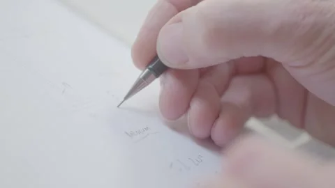 Writing with a mechanical pencil Stock Footage 163414082