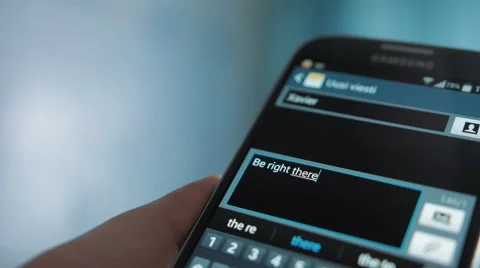 Writing a message on a smartphone 2 Stock Footage 50090622