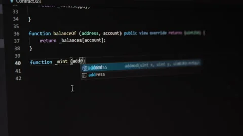Writing mint function in smart contract code Stock Footage 153814938