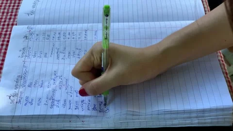 Writing name in the book during covid Stock Footage 192306567