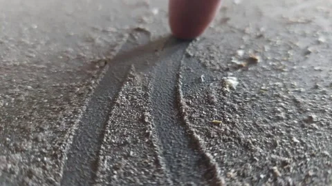 Writing "NO" with a finger in a thick layer of dust Stock Footage 333643659